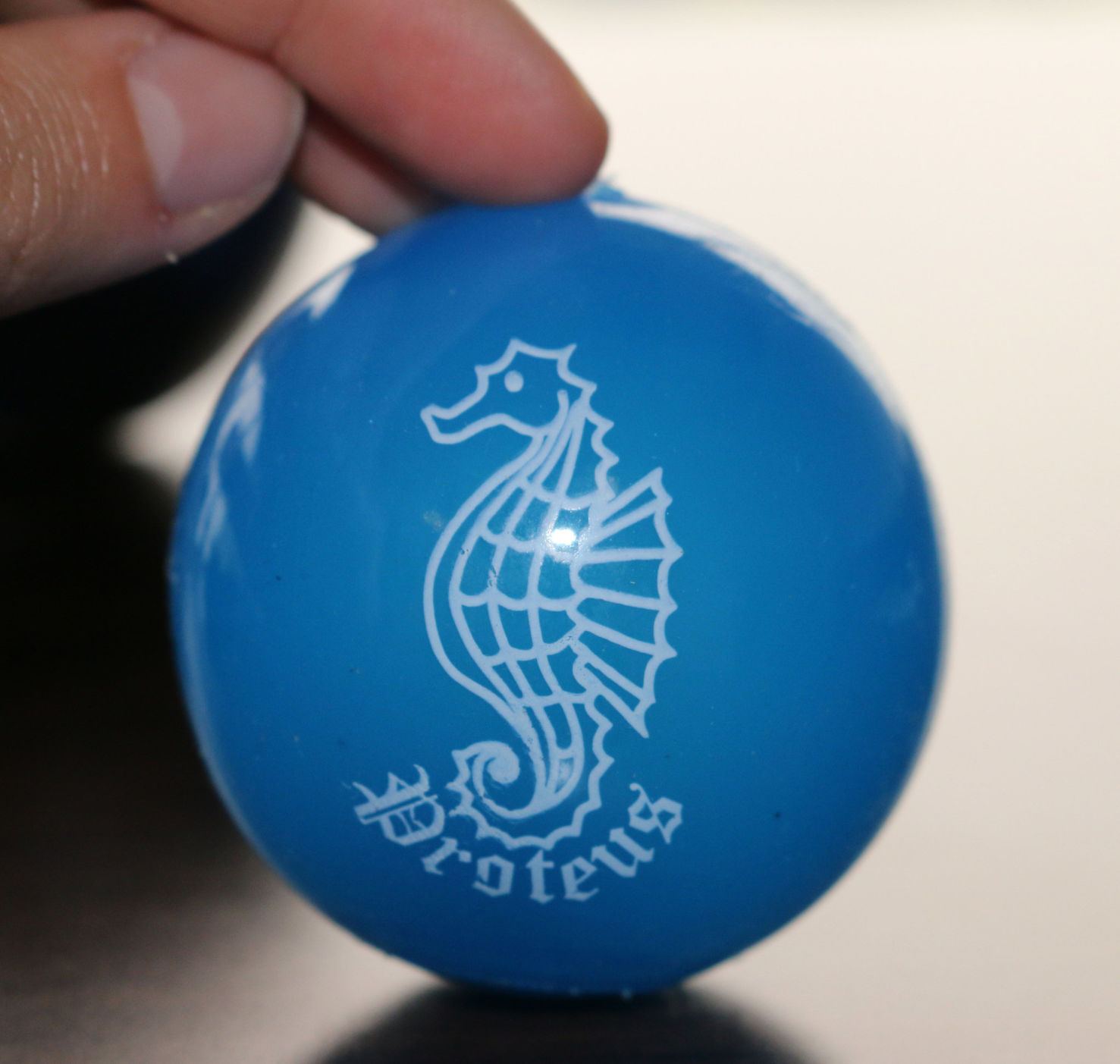 Krewe of Proteus throws: tridents, seahorses and mermaids